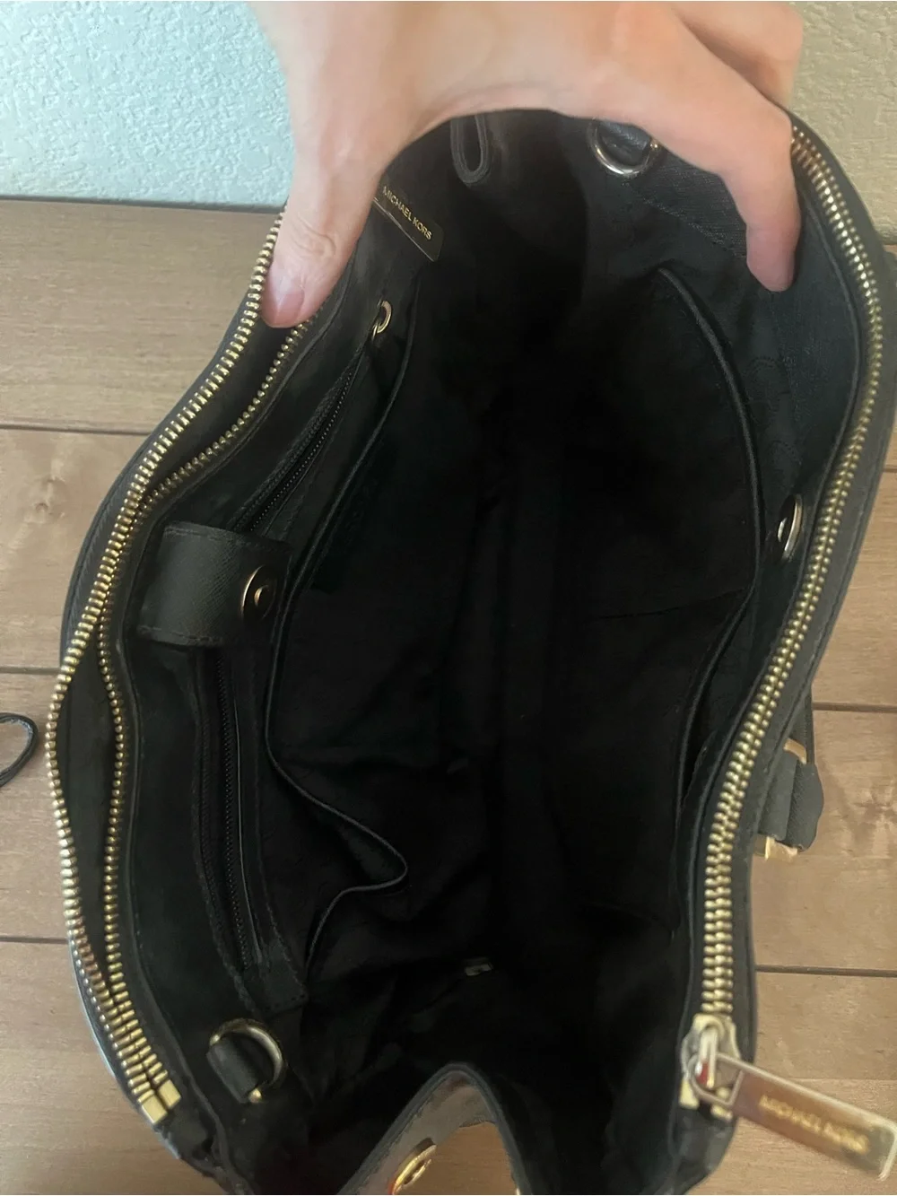 Michael Kors Black Saffiano Leather Tote with Gold Hardware.